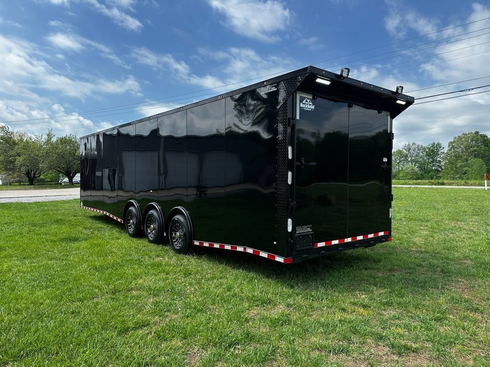 New 2026 Rock Solid Cargo 8.5x32 Race Trailer-Finished Interior-Triple 7000 TORSIONS -HD RAMP-10" BOGEY WHEELS-50 AMP ELECTRIC PACKAGE