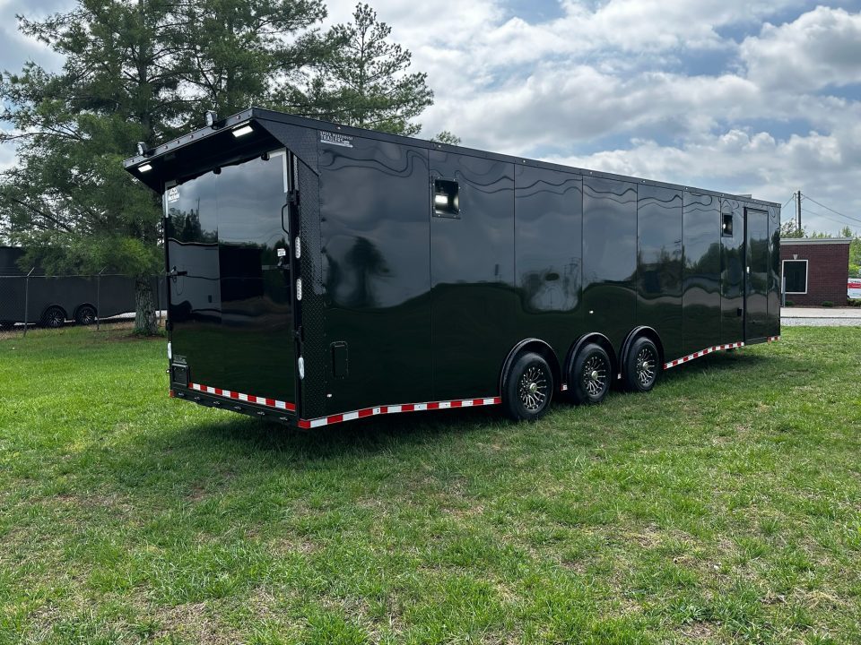 New 2026 Rock Solid Cargo 8.5x32 Race Trailer-Finished Interior-Triple 7000 TORSIONS -HD RAMP-10" BOGEY WHEELS-50 AMP ELECTRIC PACKAGE