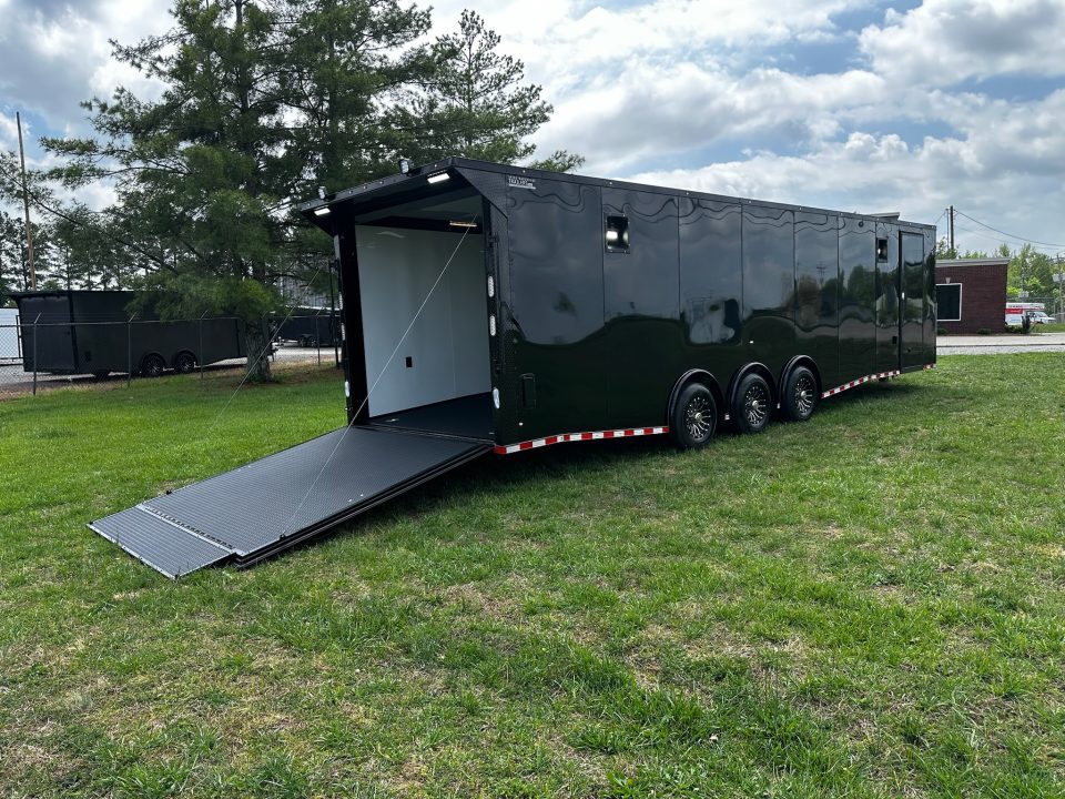 New 2026 Rock Solid Cargo 8.5x32 Race Trailer-Finished Interior-Triple 7000 TORSIONS -HD RAMP-10" BOGEY WHEELS-50 AMP ELECTRIC PACKAGE
