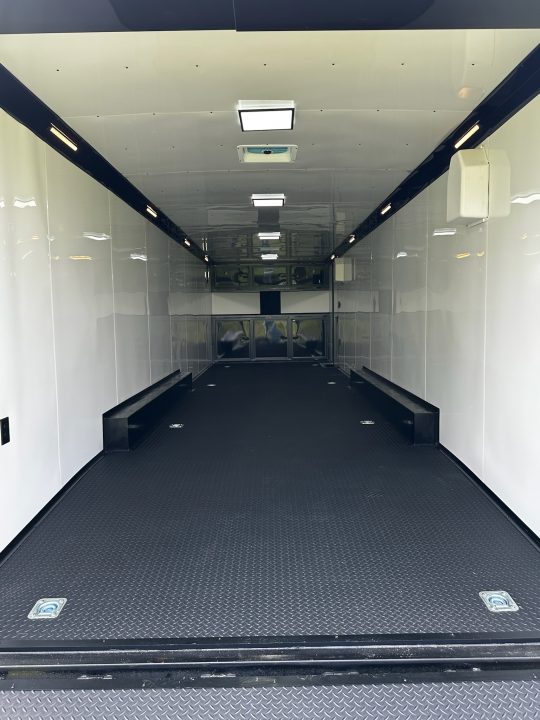New 2026 Rock Solid Cargo 8.5x32 Race Trailer-Finished Interior-Triple 7000 TORSIONS -HD RAMP-10" BOGEY WHEELS-50 AMP ELECTRIC PACKAGE