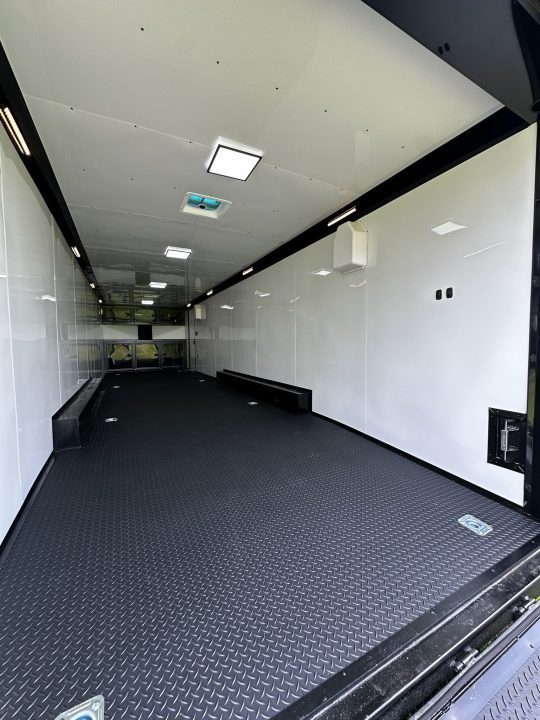 New 2026 Rock Solid Cargo 8.5x32 Race Trailer-Finished Interior-Triple 7000 TORSIONS -HD RAMP-10" BOGEY WHEELS-50 AMP ELECTRIC PACKAGE