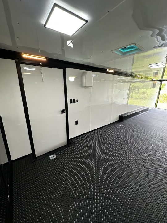 New 2026 Rock Solid Cargo 8.5x32 Race Trailer-Finished Interior-Triple 7000 TORSIONS -HD RAMP-10" BOGEY WHEELS-50 AMP ELECTRIC PACKAGE