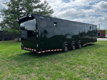 New 2026 Rock Solid Cargo 8.5x32 Race Trailer-Finished Interior-Triple 7000 TORSIONS -HD RAMP-10" BOGEY WHEELS-50 AMP ELECTRIC PACKAGE