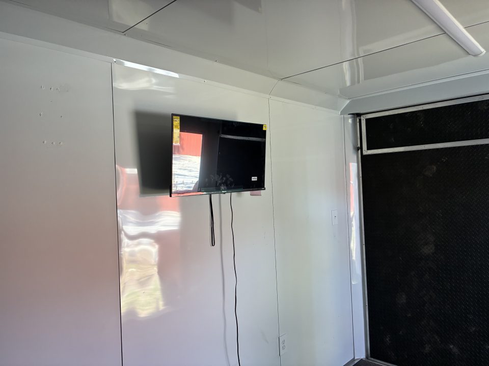 Used 2025 All World Trailers 8.5 X 22 Enclosed Toy Hauler with Murphy Type Bed, Shower, AC, Toilet and Concession Windows