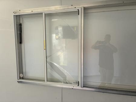 Used 2025 All World Trailers 8.5 X 22 Enclosed Toy Hauler with Murphy Type Bed, Shower, AC, Toilet and Concession Windows
