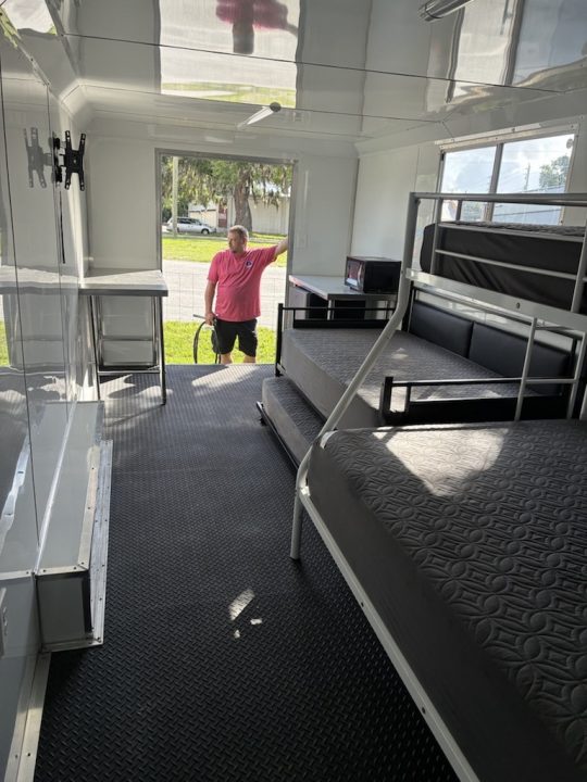 Used 2025 8.5x24 Black Enclosed Concession & Travel Trailer with A/C, Bunk Beds & Bathroom