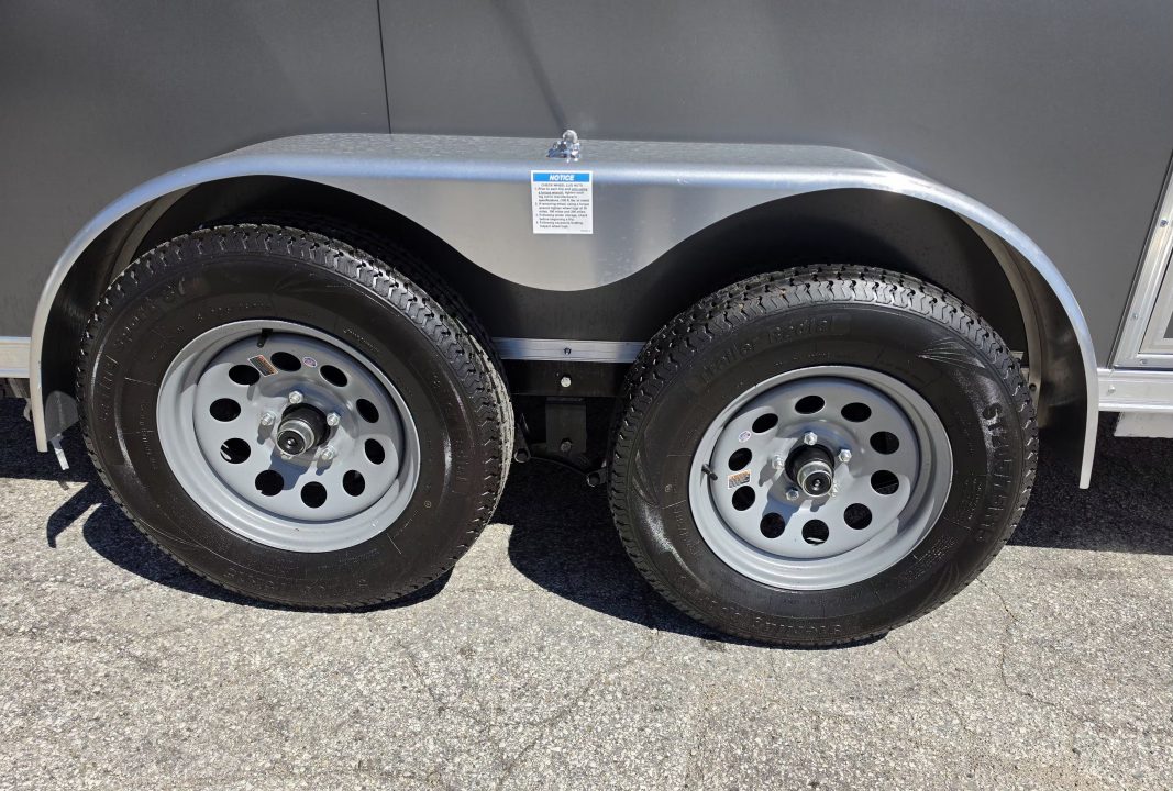 New 7 X 12 CARGO ENCLOSED TANDEM AXLE LIGHTNING ALL ALUMINUM REAR RAMP DOOR 2026