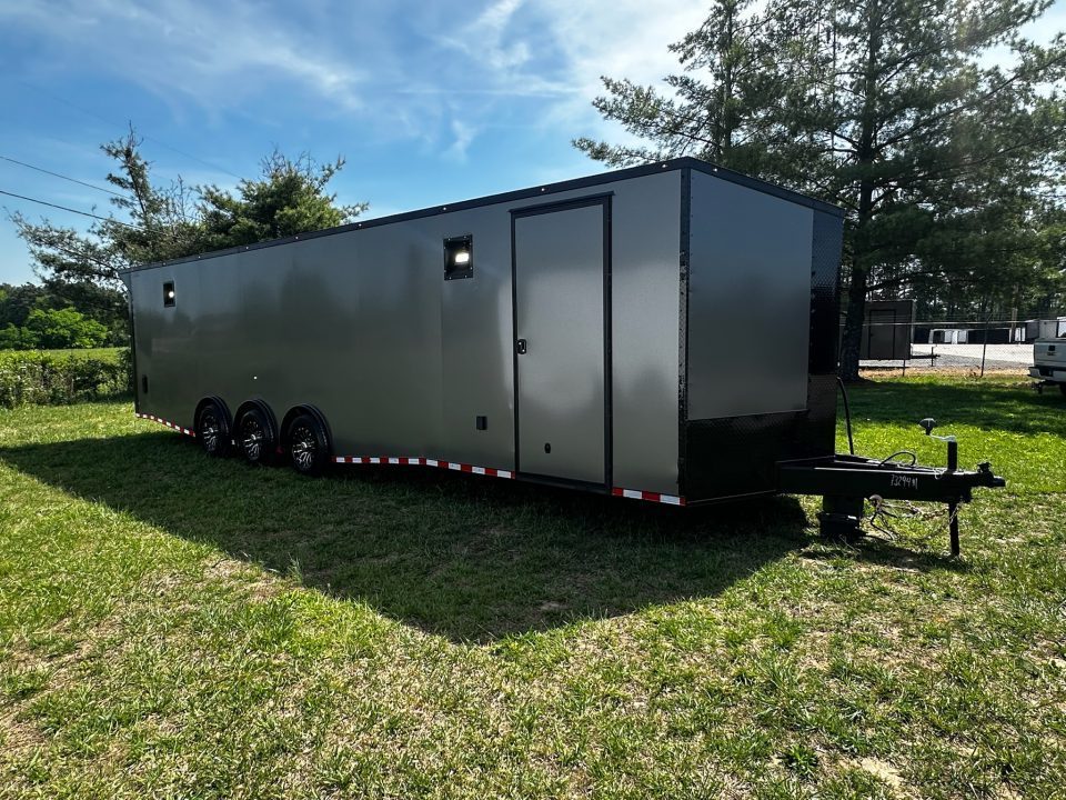 New 2026 Rock Solid Cargo 8.5x32 Race Trailer-Finished Interior-Triple 7000 TORSIONS -HD RAMP-10" BOGEY WHEELS-50 AMP ELECTRIC PACKAGE