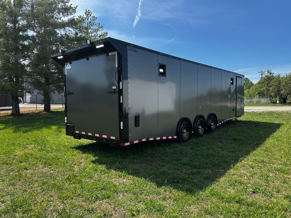 New 2026 Rock Solid Cargo 8.5x32 Race Trailer-Finished Interior-Triple 7000 TORSIONS -HD RAMP-10" BOGEY WHEELS-50 AMP ELECTRIC PACKAGE