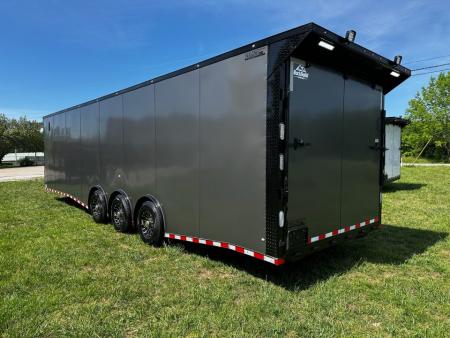 New 2026 Rock Solid Cargo 8.5x32 Race Trailer-Finished Interior-Triple 7000 TORSIONS -HD RAMP-10" BOGEY WHEELS-50 AMP ELECTRIC PACKAGE