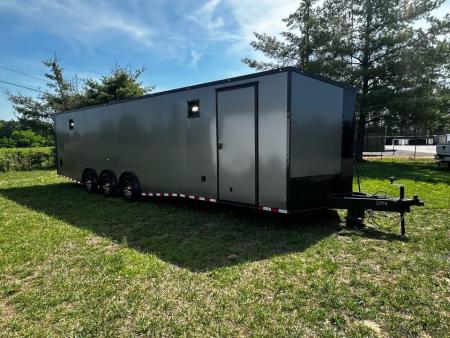 New 2026 Rock Solid Cargo 8.5x32 Race Trailer-Finished Interior-Triple 7000 TORSIONS -HD RAMP-10" BOGEY WHEELS-50 AMP ELECTRIC PACKAGE