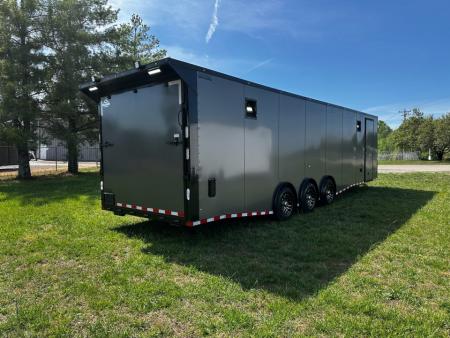 New 2026 Rock Solid Cargo 8.5x32 Race Trailer-Finished Interior-Triple 7000 TORSIONS -HD RAMP-10" BOGEY WHEELS-50 AMP ELECTRIC PACKAGE