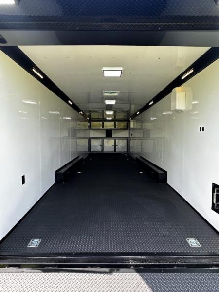 New 2026 Rock Solid Cargo 8.5x32 Race Trailer-Finished Interior-Triple 7000 TORSIONS -HD RAMP-10" BOGEY WHEELS-50 AMP ELECTRIC PACKAGE