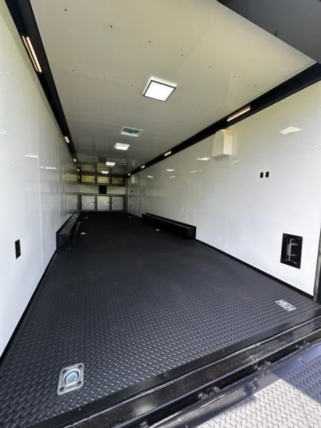 New 2026 Rock Solid Cargo 8.5x32 Race Trailer-Finished Interior-Triple 7000 TORSIONS -HD RAMP-10" BOGEY WHEELS-50 AMP ELECTRIC PACKAGE