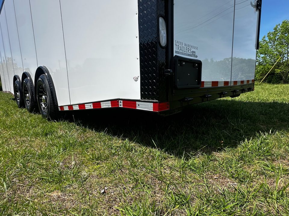 New 2026 Rock Solid Cargo 8.5x28 Race Trailer-Finished Interior-Triple 7000 TORSIONS -HD RAMP-10" BOGEY WHEELS