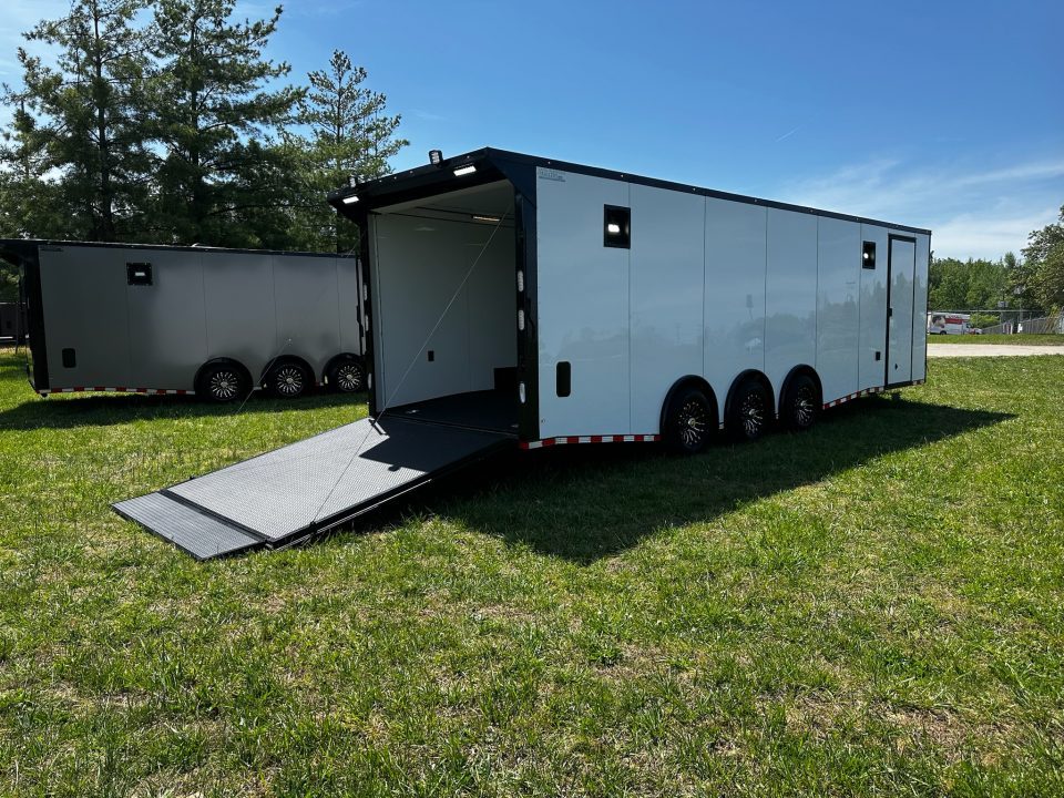 New 2026 Rock Solid Cargo 8.5x28 Race Trailer-Finished Interior-Triple 7000 TORSIONS -HD RAMP-10" BOGEY WHEELS