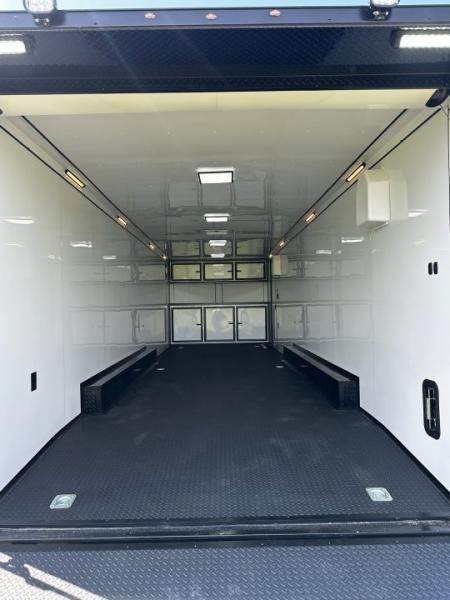 New 2026 Rock Solid Cargo 8.5x28 Race Trailer-Finished Interior-Triple 7000 TORSIONS -HD RAMP-10" BOGEY WHEELS