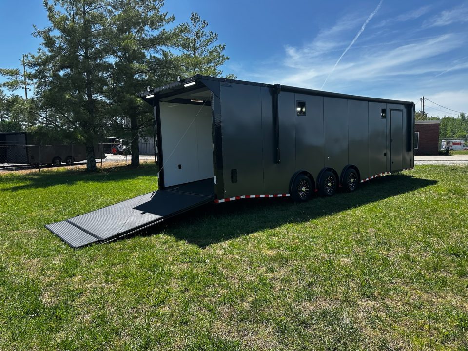 New 8.5x32 Race Trailer-7'6" Interior-Finished Interior-FLAT FRONT-7000lbs Triple Torsions-24ft Awning- HD Ramp- GEN BOX