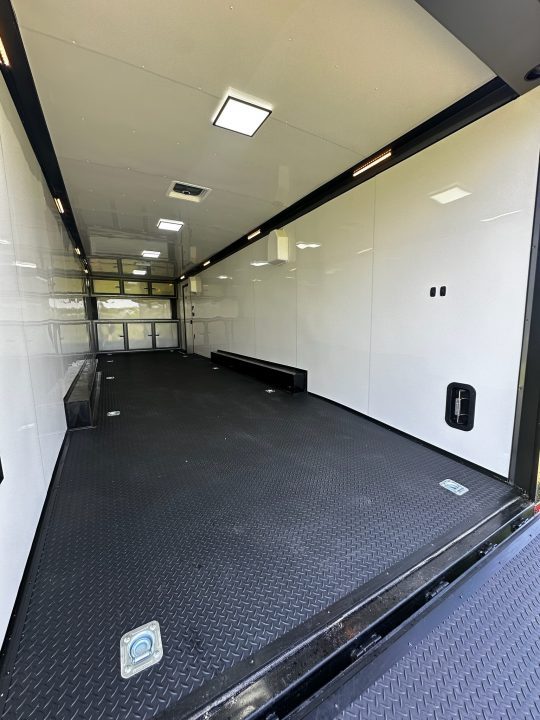 New 8.5x32 Race Trailer-7'6" Interior-Finished Interior-FLAT FRONT-7000lbs Triple Torsions-24ft Awning- HD Ramp- GEN BOX