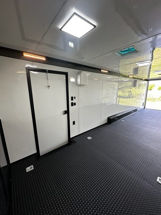 New 8.5x32 Race Trailer-7'6" Interior-Finished Interior-FLAT FRONT-7000lbs Triple Torsions-24ft Awning- HD Ramp- GEN BOX