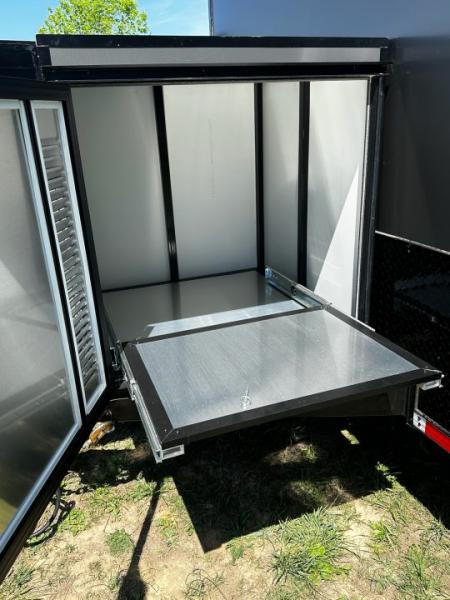 New 8.5x32 Race Trailer-7'6" Interior-Finished Interior-FLAT FRONT-7000lbs Triple Torsions-24ft Awning- HD Ramp- GEN BOX