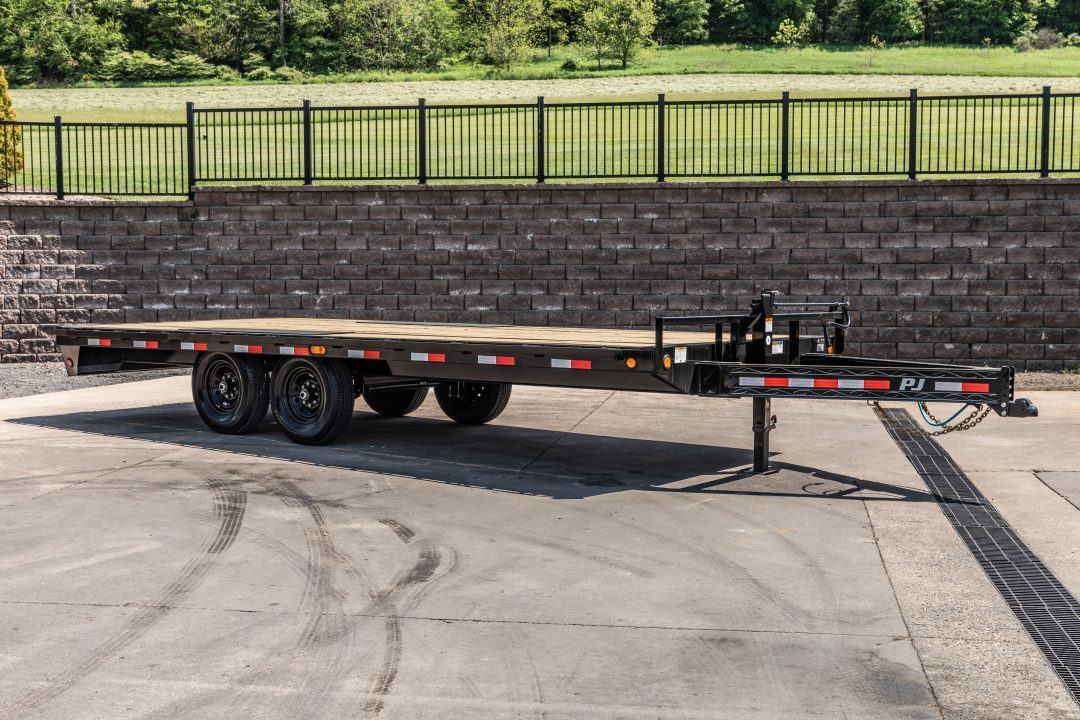 New PJ Trailers 20' I-Beam Deck Over with Slide in Ramps (F8)