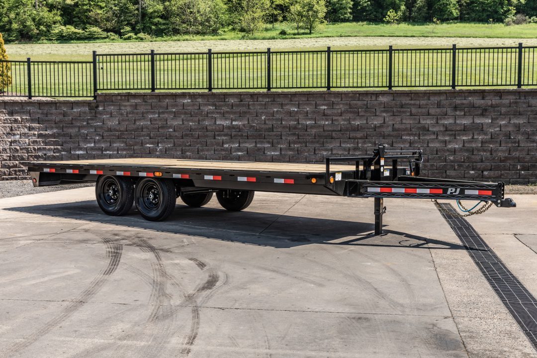 New PJ Trailers 20' I-Beam Deck Over with Slide in Ramps (F8)
