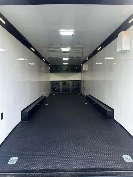 New 2026 Rock Solid Cargo 8.5x28 Race Trailer-Finished Interior-7'6" Interior-Triple 7000 TORSIONS -HD RAMP-10" BOGEY WHEELS