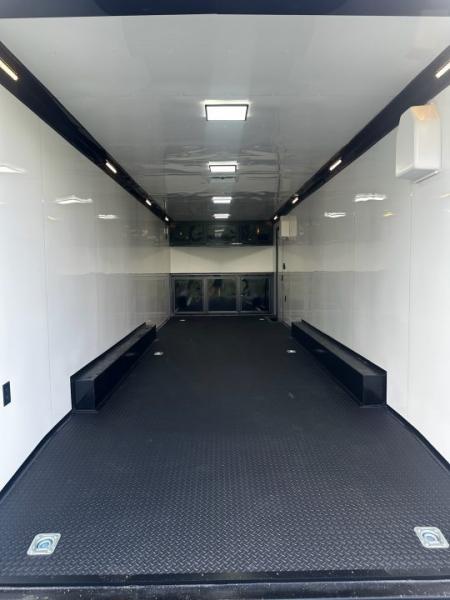 New 2026 Rock Solid Cargo 8.5x28 Race Trailer-Finished Interior-7'6" Interior-Triple 7000 TORSIONS -HD RAMP-10" BOGEY WHEELS