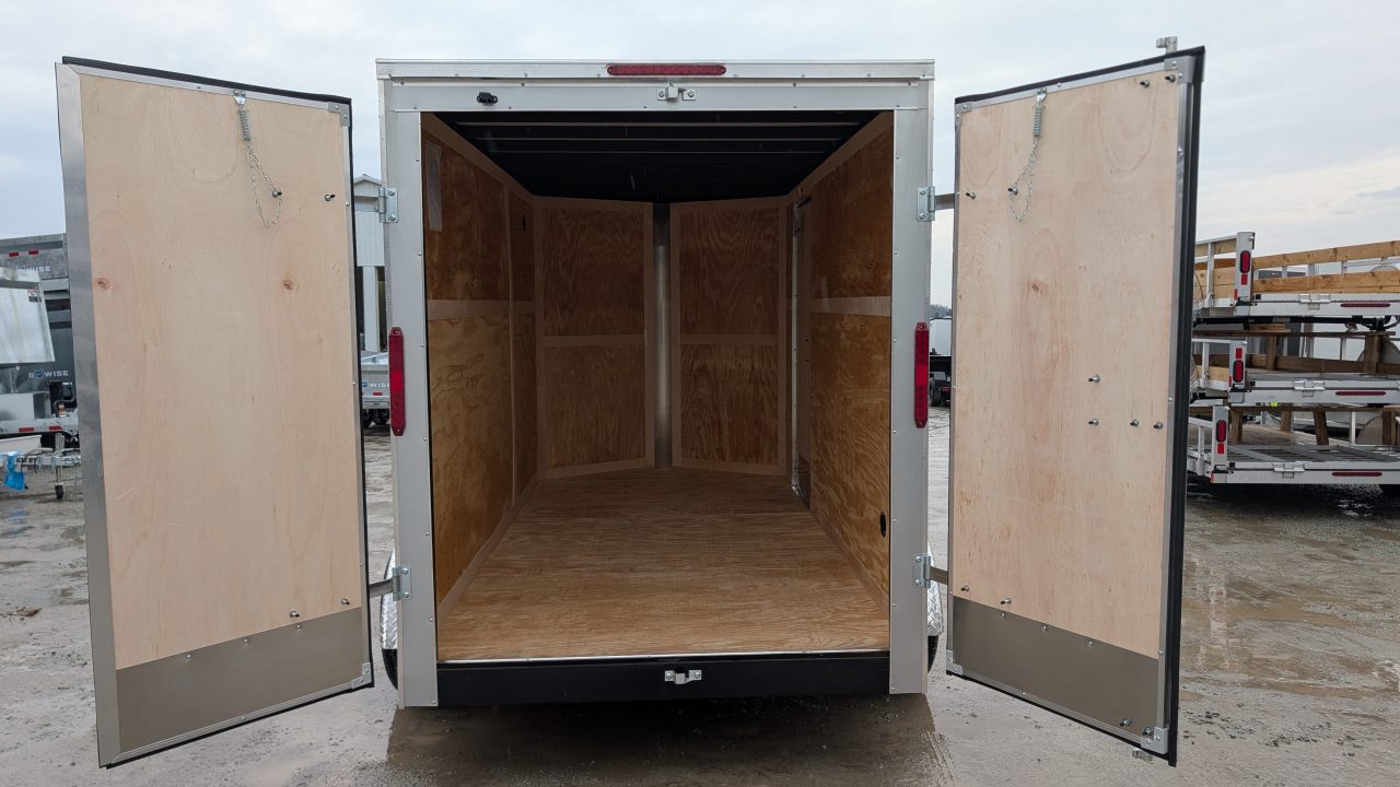 New 2026 Homesteader 6x10 Intrepid V-Nose Cargo Trailer w/ Barn Doors