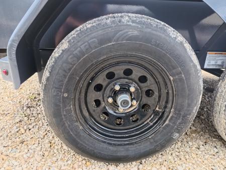 New 2026 Norstar 60 x 10 DCB Gray Dump Trailer with 7K GVWR, Adj. 14K 2 5/16" Coupler, 8 Ply ST205/75 R15 LRD Tires