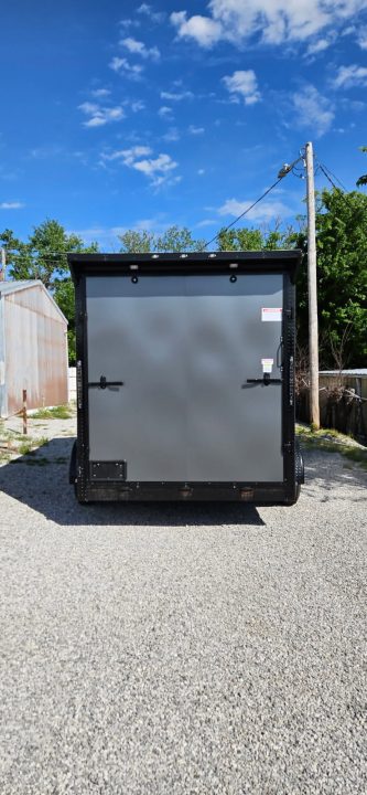 New 2026 Family Trailer 7x14 Tandem Axles Cargo / Enclosed Trailer- Screwless Exterior- Blackout Pkg- Rear Spoiler- HD Axles