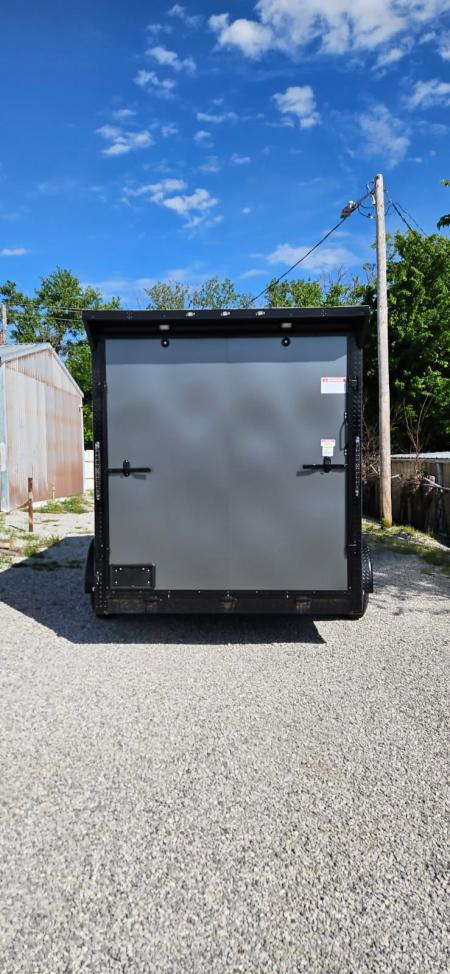 New 2026 Family Trailer 7x14 Tandem Axles Cargo / Enclosed Trailer- Screwless Exterior- Blackout Pkg- Rear Spoiler- HD Axles