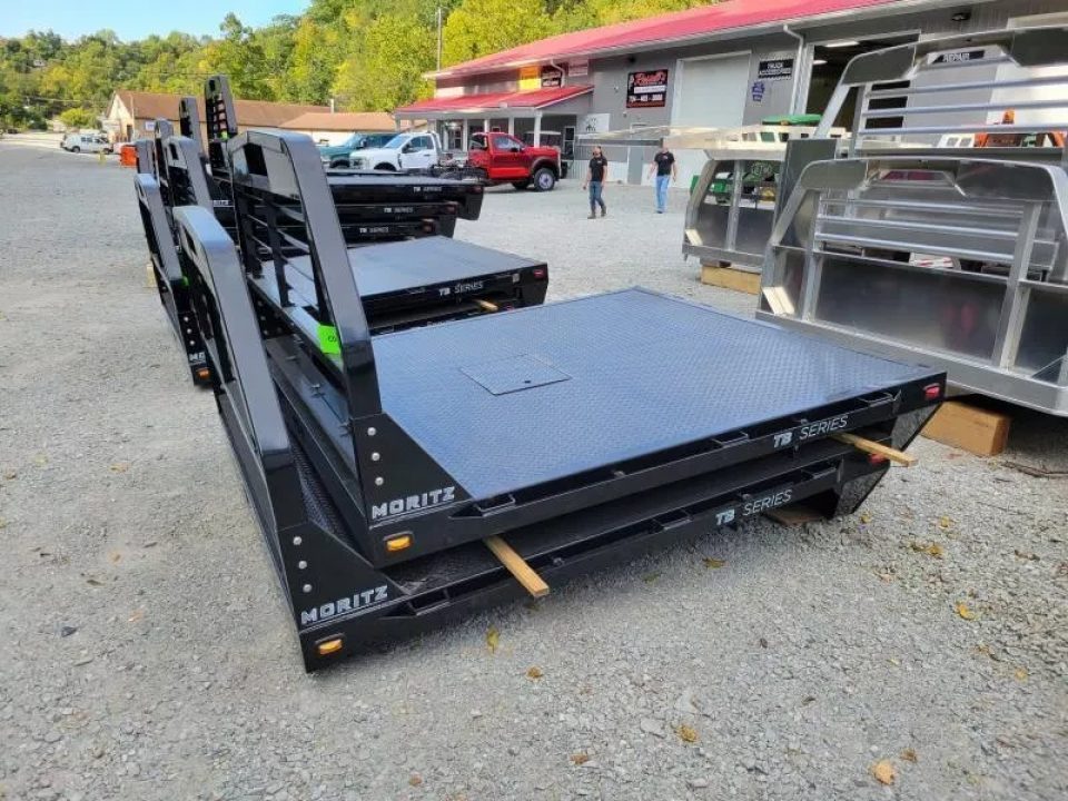 New Moritz International TB7-7 SRW 6.5' Flatbed w/Trap Door and Gooseneck Hitch Plate