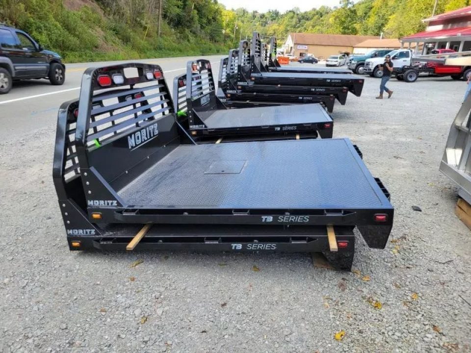 New Moritz International TB7-7 SRW 6.5' Flatbed w/Trap Door and Gooseneck Hitch Plate