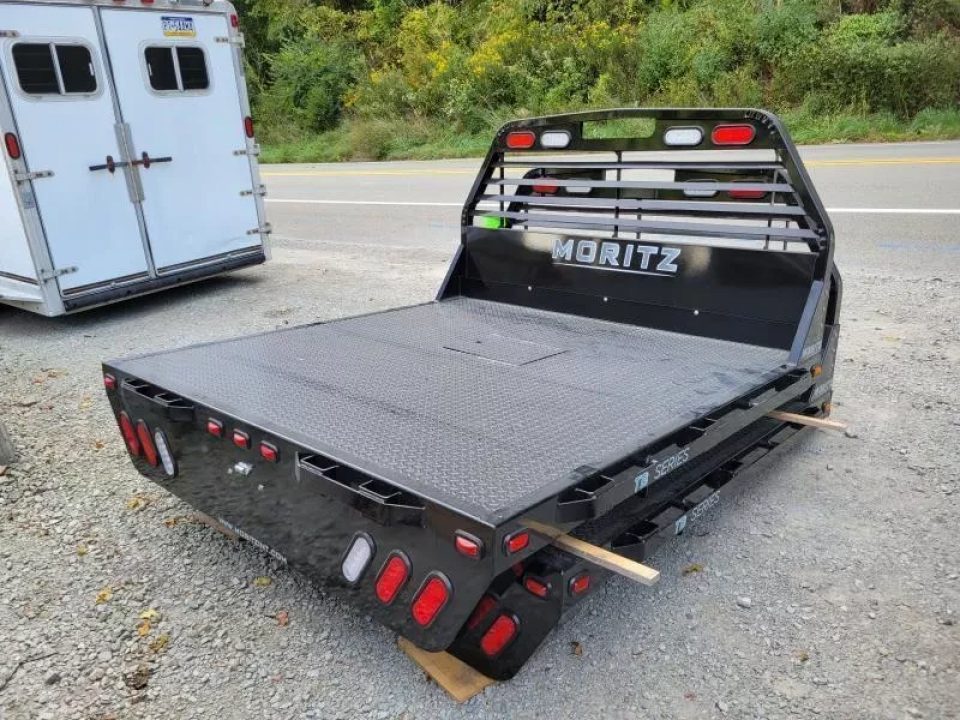 New Moritz International TB7-7 SRW 6.5' Flatbed w/Trap Door and Gooseneck Hitch Plate