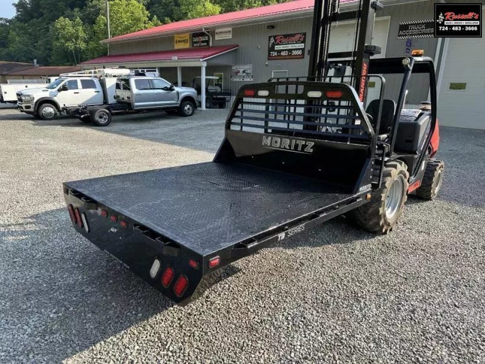 New Moritz International TB7-7 SRW 6.5' Flatbed w/Trap Door and Gooseneck Hitch Plate