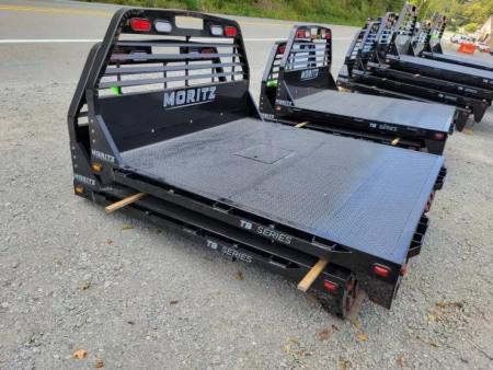 New Moritz International TB7-7 SRW 6.5' Flatbed w/Trap Door and Gooseneck Hitch Plate