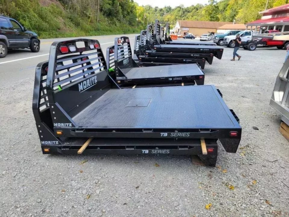 New Moritz International TB7-7 SRW 6.5' Flatbed w/Trap Door and Gooseneck Hitch Plate