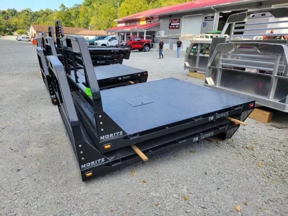 New Moritz International TB7-7 SRW 6.5' Flatbed w/Trap Door and Gooseneck Hitch Plate