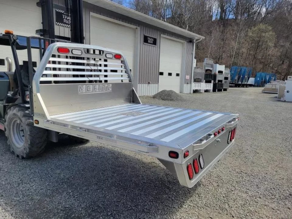New Moritz International TBA7-7 SRW ALUMINUM 6.5' Flatbed w/Trap Door and Gooseneck Hitch Plate