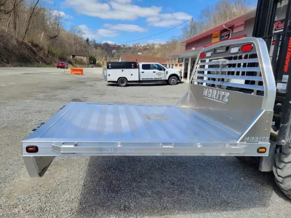 New Moritz International TBA7-7 SRW ALUMINUM 6.5' Flatbed w/Trap Door and Gooseneck Hitch Plate