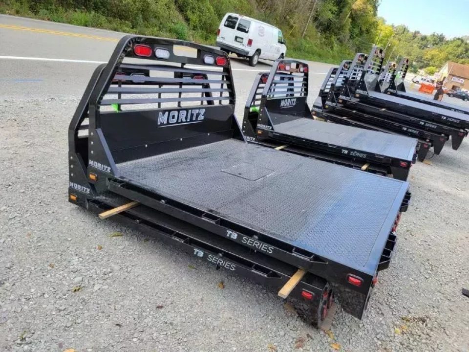 New Moritz International TB7-7 SRW 6.5' Flatbed w/Trap Door and Gooseneck Hitch Plate