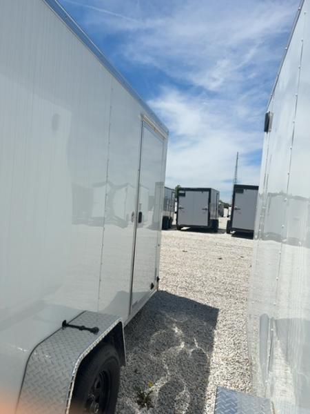New 2026 Impact Trailers Quake 6x12 3K Ramp Door V-Nose