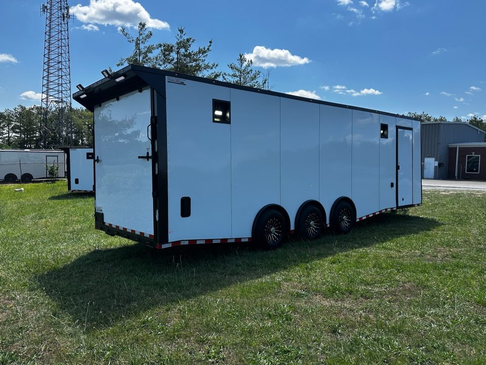 New 2026 Rock Solid Cargo 8.5x28 Race Trailer-Finished Interior-7'6" Interior - Triple 7000 TORSIONS -HD RAMP-10" BOGEY WHEELS