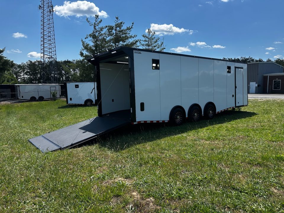 New 2026 Rock Solid Cargo 8.5x28 Race Trailer-Finished Interior-7'6" Interior - Triple 7000 TORSIONS -HD RAMP-10" BOGEY WHEELS