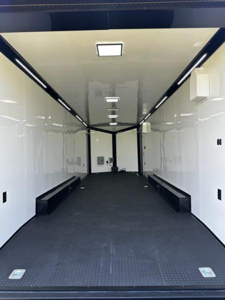 New 2026 Rock Solid Cargo 8.5x28 Race Trailer-Finished Interior-7'6" Interior - Triple 7000 TORSIONS -HD RAMP-10" BOGEY WHEELS