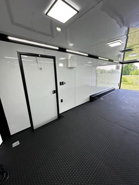 New 2026 Rock Solid Cargo 8.5x28 Race Trailer-Finished Interior-7'6" Interior - Triple 7000 TORSIONS -HD RAMP-10" BOGEY WHEELS
