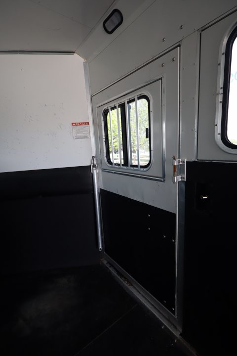 Used 2007 Sundowner 7 Horse Mid-tack Trailer