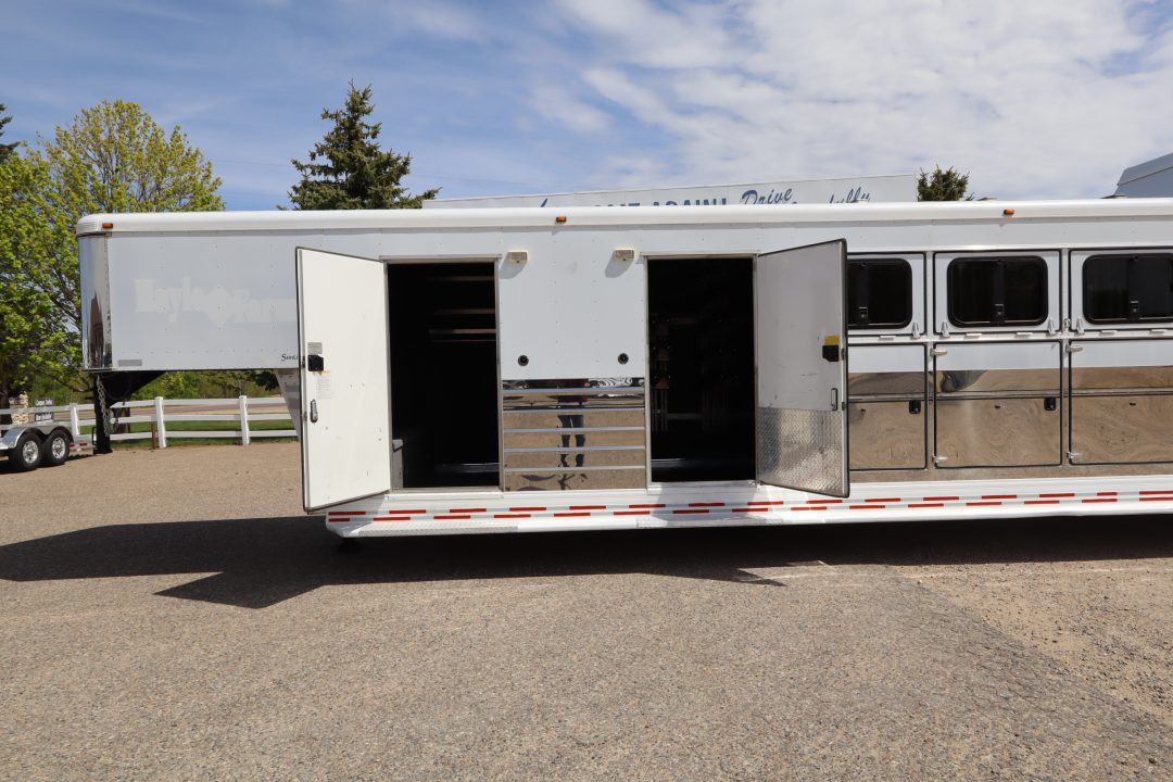 Used 2007 Sundowner 7 Horse Mid-tack Trailer